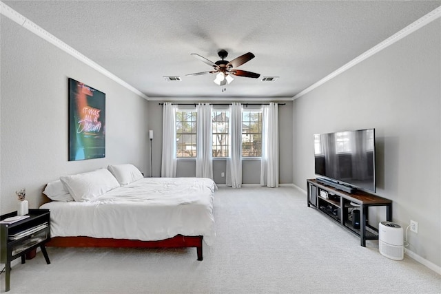 2004 Wood Glen Dr, Round Rock, TX 78681 - carpeted bedroom featuring ornamental molding, a textured ceiling, and ceiling fan