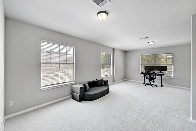 2004 Wood Glen Dr, Round Rock, TX 78681 - living area featuring carpet and baseboards