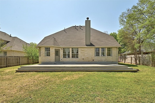 2004 Wood Glen Dr, Round Rock, TX 78681 - rear view of property featuring a fenced backyard, a chimney, and a wooden deck