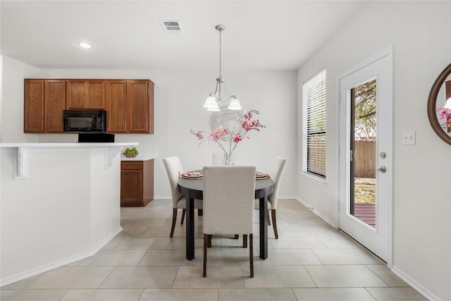 dining area featuring baseboards, visible vents, recessed lighting, and a notable chandelier