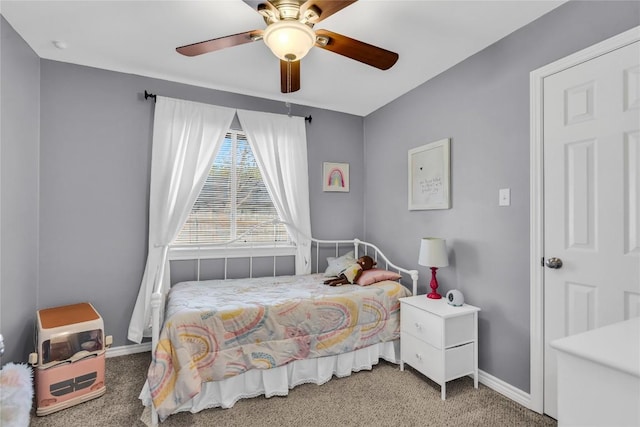 704 Firethorn Ln, Round Rock, TX 78664 - bedroom with carpet floors, baseboards, and ceiling fan