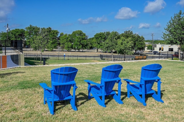 5400 Golden Canary Ln Unit 49, Austin, TX 78723 - surrounding community with fence and a lawn