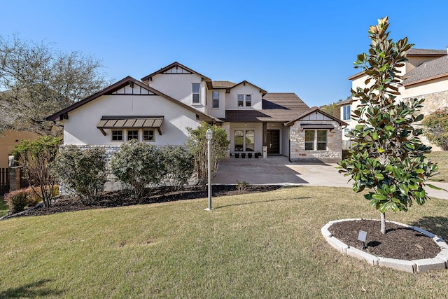 15089 Joseph Dr, Austin, TX 78734 - rear view of property featuring stucco siding, a lawn, a patio area, and stone siding