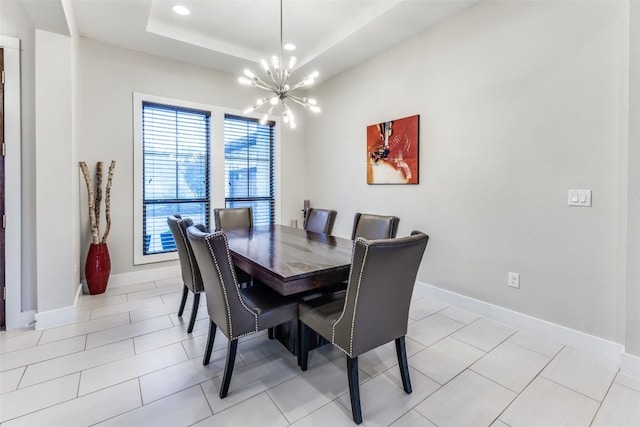 15089 Joseph Dr, Austin, TX 78734 - dining area featuring a chandelier, recessed lighting, a tray ceiling, and light tile patterned floors