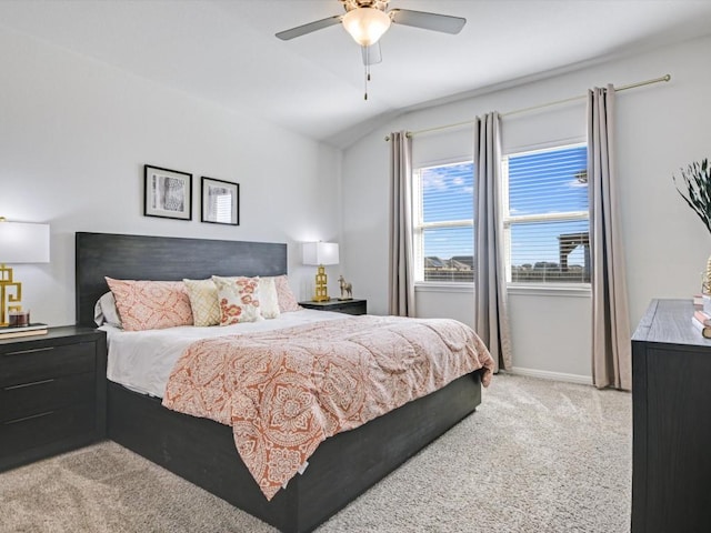 218 Pearland St, Hutto, TX 78634 - bedroom with light colored carpet, vaulted ceiling, baseboards, and ceiling fan