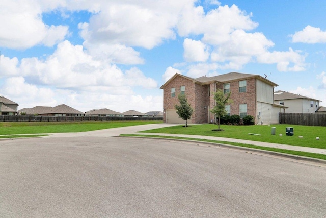 218 Pearland St, Hutto, TX 78634 - view of front of property with brick siding, driveway, a garage, and a residential view