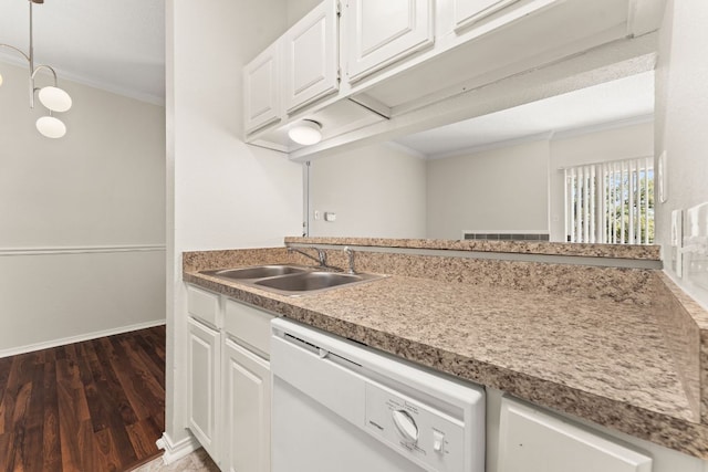 kitchen featuring crown molding, a sink, dark wood-style floors, white cabinets, and white dishwasher
