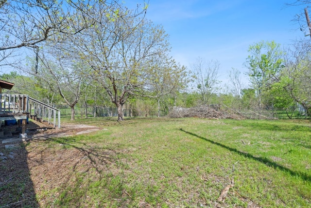 405 E Browning St, Manor, TX 78653 - view of grassy yard with a wooden deck