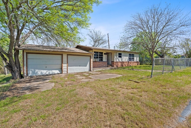 405 E Browning St, Manor, TX 78653 - single story home with brick siding and a garage