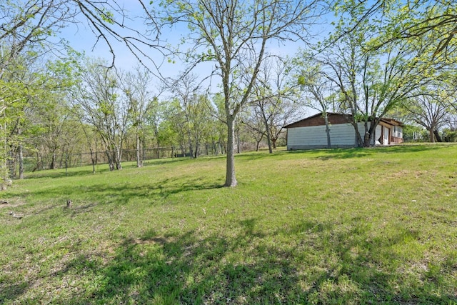 405 E Browning St, Manor, TX 78653 - view of yard with an outdoor structure and a pole building