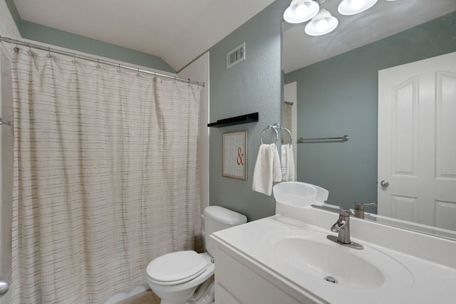 full bath with toilet, vanity, vaulted ceiling, and shower / bath combo