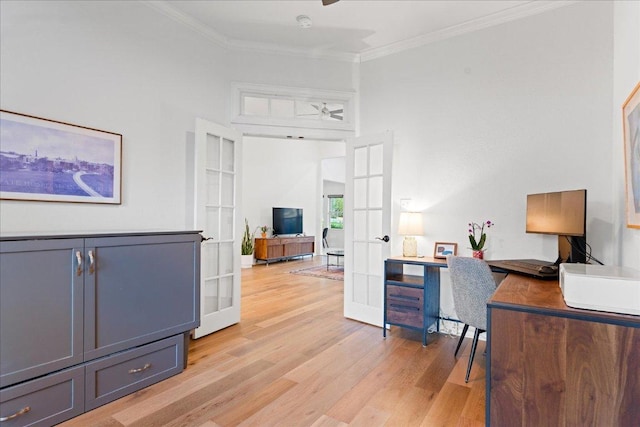office featuring light wood-style flooring and ornamental molding