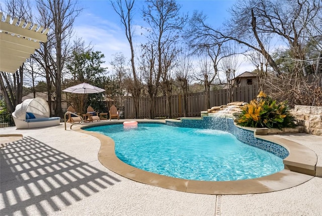 view of swimming pool with a fenced in pool, a fenced backyard, and a patio area