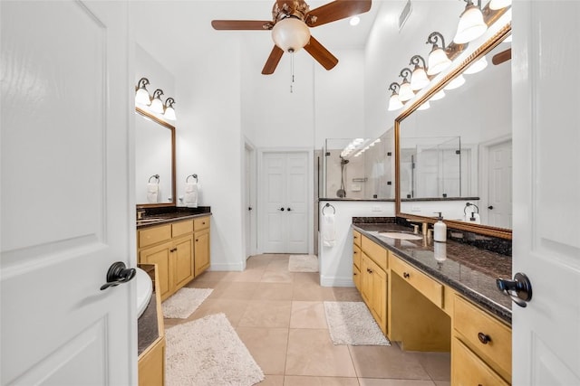 full bath with tile patterned flooring, a sink, two vanities, and ceiling fan