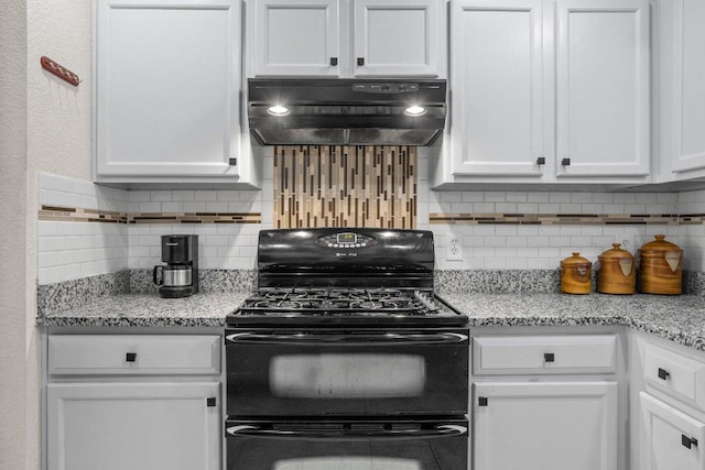 1015 Strickland Dr, Austin, TX 78748 - kitchen with exhaust hood, black range with gas stovetop, white cabinetry, and decorative backsplash