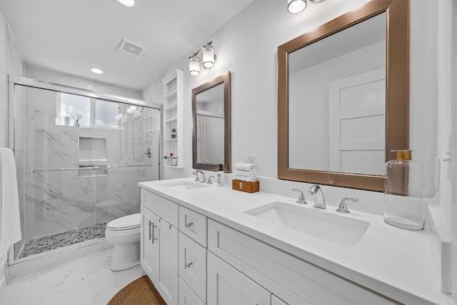 6306 Arnold Dr Unit 1, Austin, TX 78723 - full bath with double vanity, a marble finish shower, toilet, marble finish flooring, and recessed lighting
