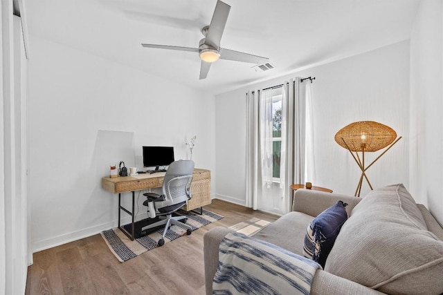 6306 Arnold Dr Unit 1, Austin, TX 78723 - home office with wood finished floors, baseboards, and a ceiling fan