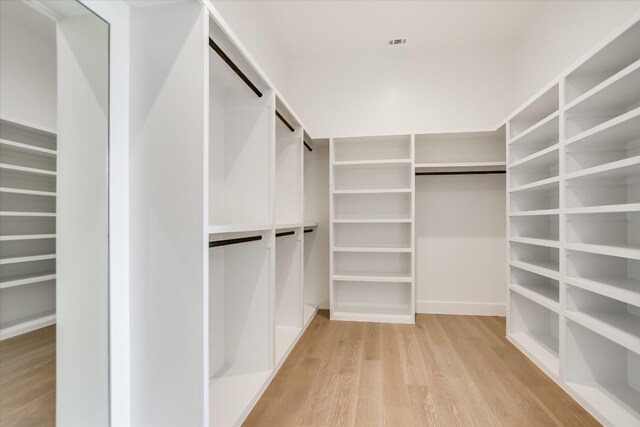 123 Azalea Loop, Horseshoe Bay, TX 78657 - spacious closet featuring light wood finished floors