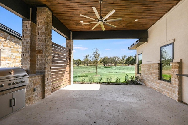 123 Azalea Loop, Horseshoe Bay, TX 78657 - view of patio featuring ceiling fan, grilling area, and an outdoor kitchen