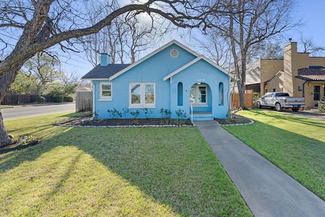 4419 Sinclair Ave, Austin, TX 78756 - view of front of house with a chimney and stucco siding