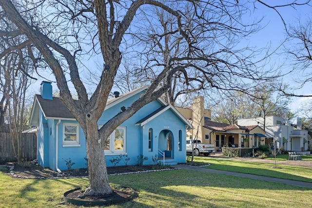 4419 Sinclair Ave, Austin, TX 78756 - view of front of home with a chimney and stucco siding