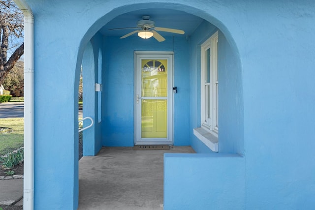 4419 Sinclair Ave, Austin, TX 78756 - view of exterior entry featuring a ceiling fan and stucco siding