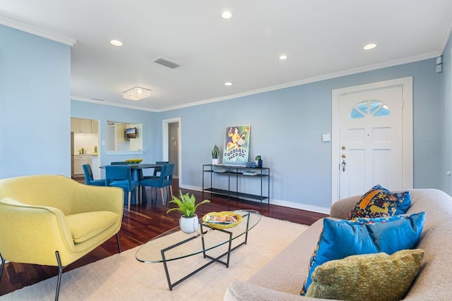4419 Sinclair Ave, Austin, TX 78756 - living room featuring wood finished floors, ornamental molding, baseboards, and recessed lighting