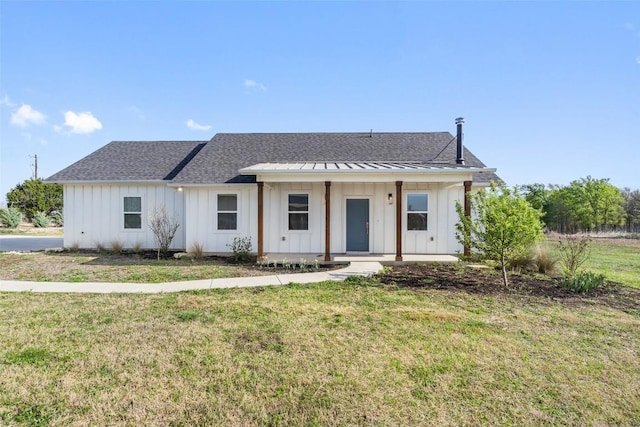 200 County Road 246, Florence, TX 76527 - modern farmhouse with board and batten siding, roof with shingles, and a front yard