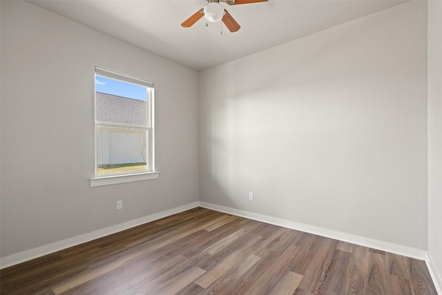 200 County Road 246, Florence, TX 76527 - unfurnished room with wood finished floors, a ceiling fan, and baseboards
