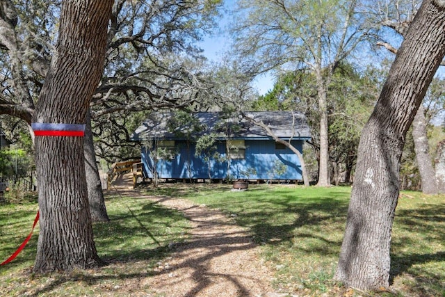 520 River Rapids Rd, Wimberley, TX 78676 - view of front of house featuring a front lawn