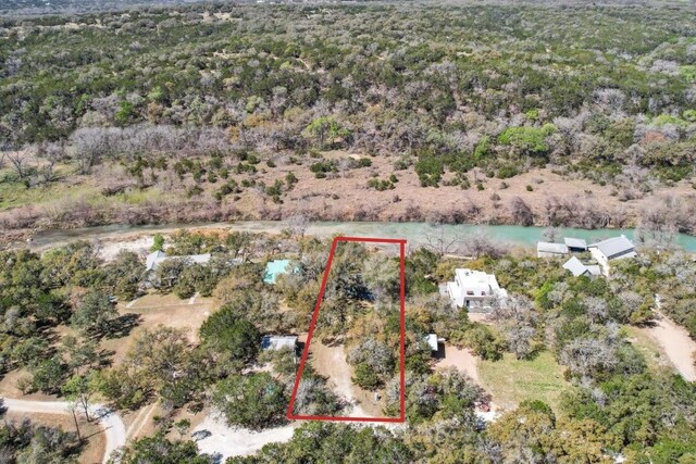 520 River Rapids Rd, Wimberley, TX 78676 - aerial overview of property's location featuring property boundaries highlighted and a nearby body of water