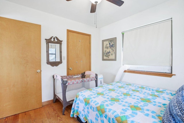 520 River Rapids Rd, Wimberley, TX 78676 - bedroom featuring wood finished floors and ceiling fan