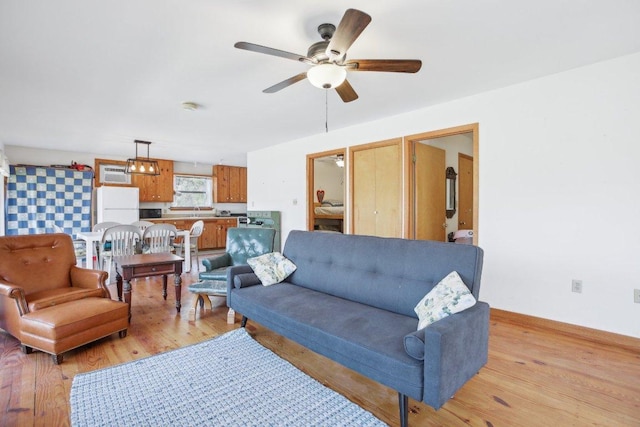 520 River Rapids Rd, Wimberley, TX 78676 - living area with a ceiling fan and light wood-type flooring