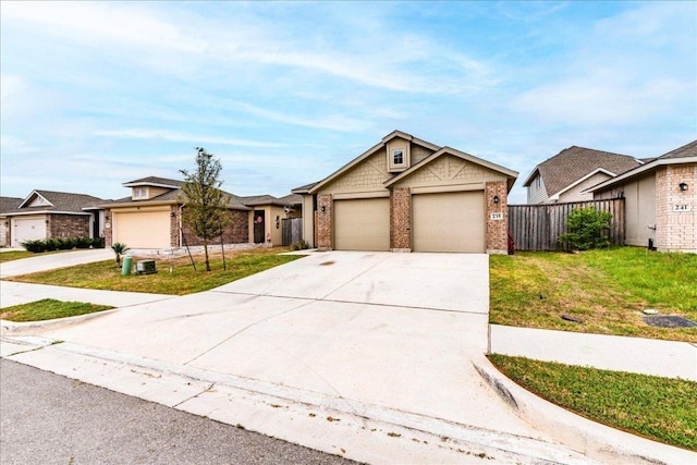 235 Witchhazel Way, San Marcos, TX 78666 - view of front of property featuring concrete driveway, brick siding, and a garage