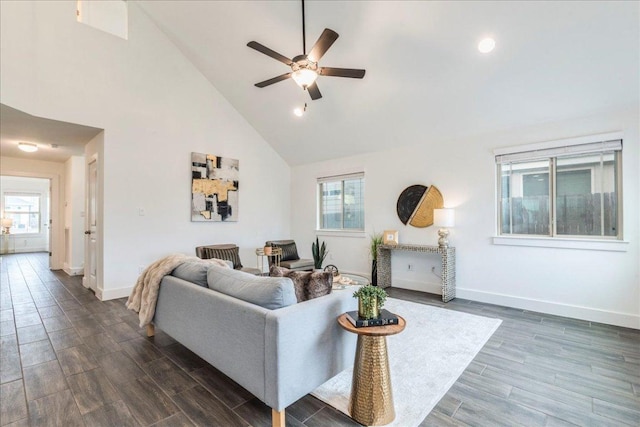 235 Witchhazel Way, San Marcos, TX 78666 - living room featuring high vaulted ceiling, a ceiling fan, plenty of natural light, dark wood finished floors, and baseboards