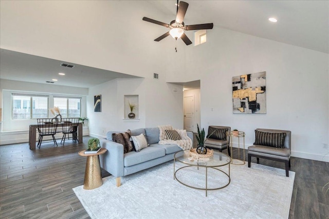 235 Witchhazel Way, San Marcos, TX 78666 - living room featuring ceiling fan, wood finished floors, baseboards, a towering ceiling, and recessed lighting