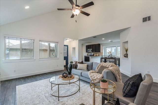 235 Witchhazel Way, San Marcos, TX 78666 - living area with dark wood-style flooring, a ceiling fan, high vaulted ceiling, baseboards, and recessed lighting
