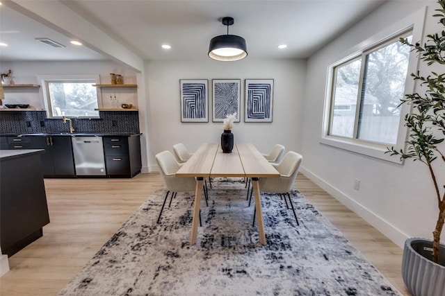 4209 Everest Ln, Austin, TX 78727 - dining room featuring light wood-style floors and recessed lighting
