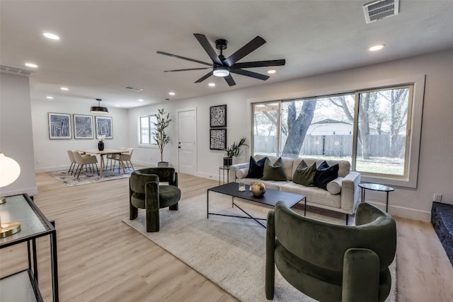 4209 Everest Ln, Austin, TX 78727 - living area featuring light wood-style flooring, a ceiling fan, and recessed lighting