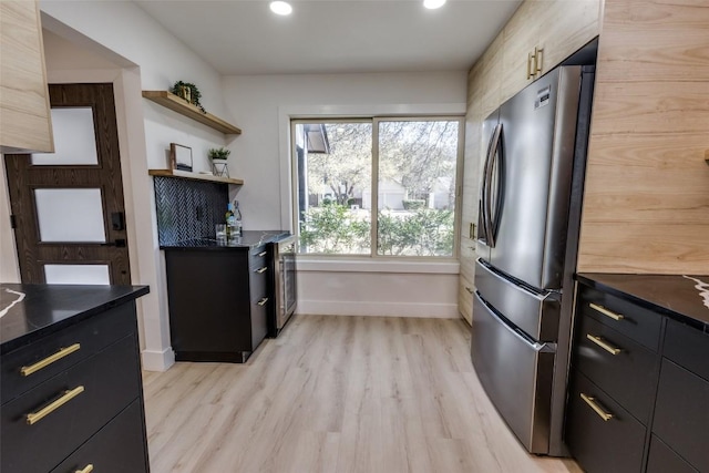 4209 Everest Ln, Austin, TX 78727 - kitchen with freestanding refrigerator, dark countertops, dark cabinetry, light wood-type flooring, and open shelves