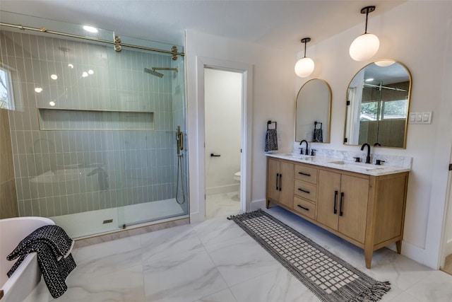 4209 Everest Ln, Austin, TX 78727 - full bath with a stall shower, double vanity, marble finish floors, and a bathtub
