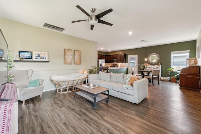 14128 Sandrock Bnd, Pflugerville, TX 78660 - living room with a ceiling fan, wood finished floors, and recessed lighting