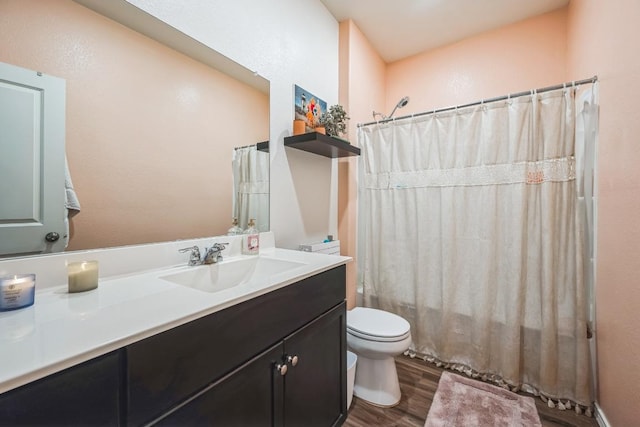 14128 Sandrock Bnd, Pflugerville, TX 78660 - full bath with toilet, vanity, wood finished floors, and shower / bath combo