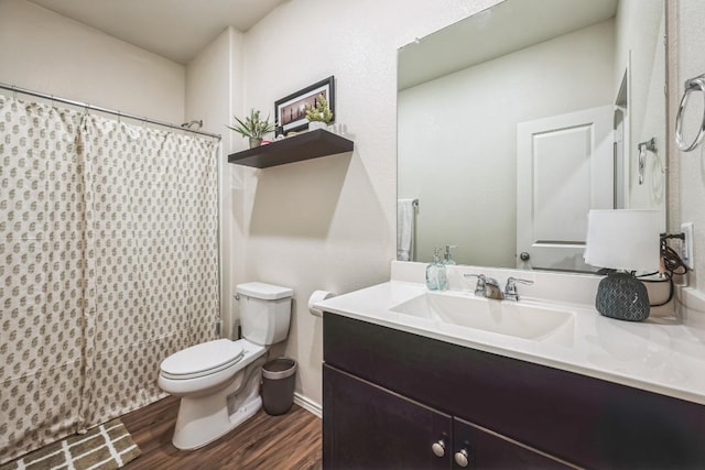 14128 Sandrock Bnd, Pflugerville, TX 78660 - bathroom with toilet, wood finished floors, vanity, and a shower with curtain