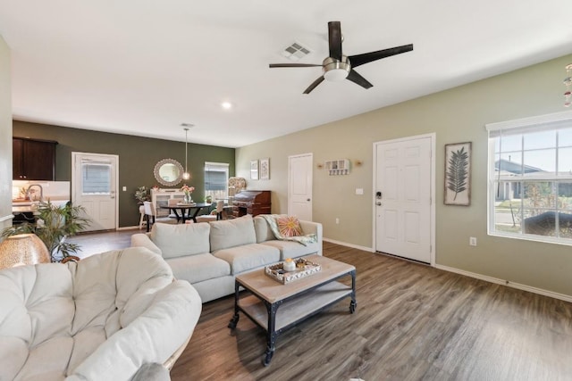 14128 Sandrock Bnd, Pflugerville, TX 78660 - living room with ceiling fan, wood finished floors, baseboards, and recessed lighting