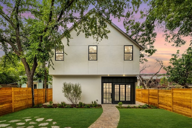 933 E 52nd St, Austin, TX 78751 - back of house with french doors and stucco siding