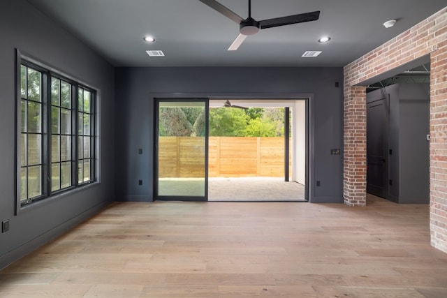 933 E 52nd St, Austin, TX 78751 - empty room featuring plenty of natural light, ceiling fan, light wood finished floors, and recessed lighting