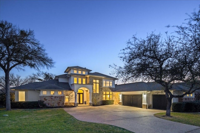 11801 Astoria Dr, Bee Cave, TX 78738 - view of front of home featuring stone siding, driveway, a garage, and a front lawn