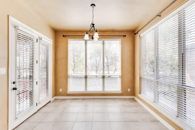 3519 Alexandrite Way, Round Rock, TX 78681 - unfurnished dining area with a chandelier and baseboards