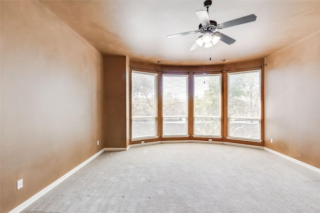 3519 Alexandrite Way, Round Rock, TX 78681 - empty room featuring carpet flooring, healthy amount of natural light, and a ceiling fan